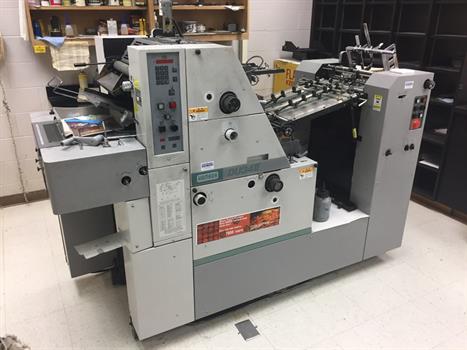 Double-sided offset printing machine
